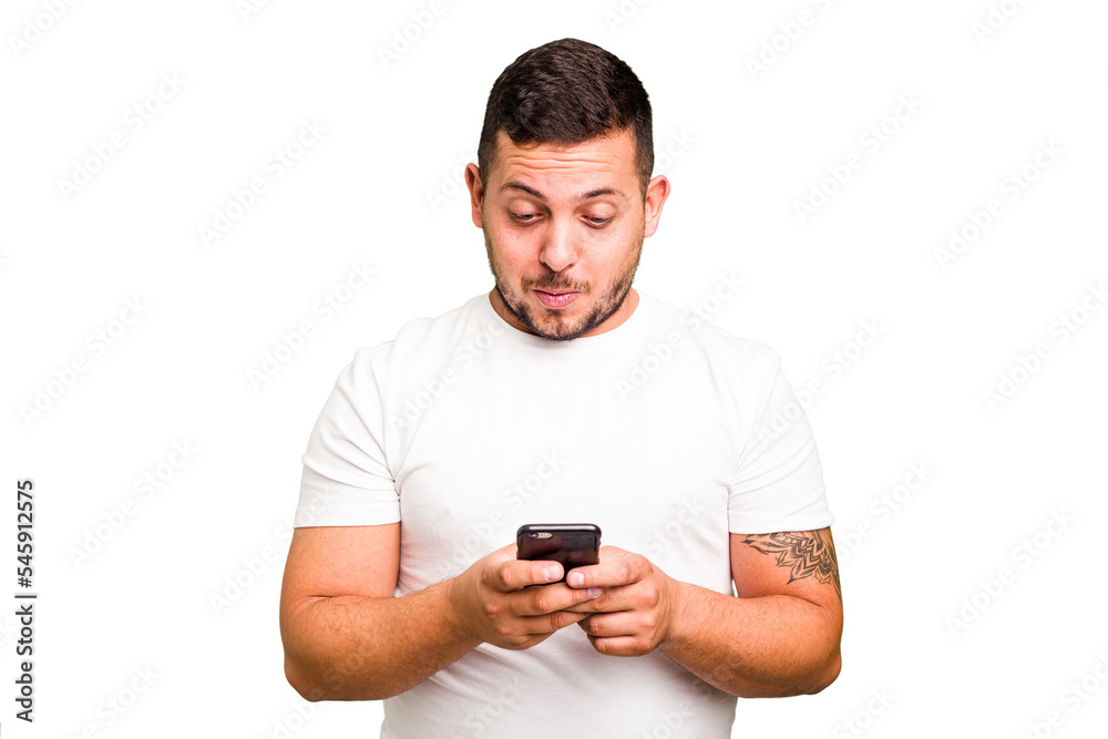 Young caucasian man using mobile phone isolated Young caucasian man using mobile phone isolated