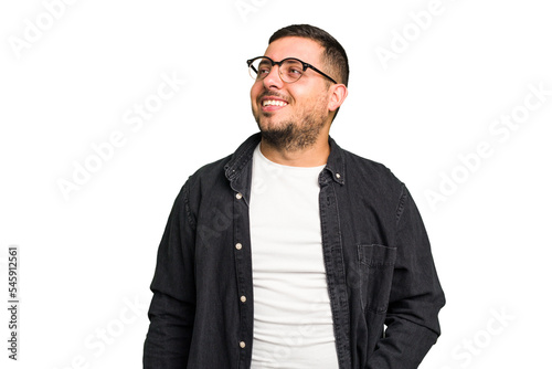 Fotografie Young caucasian man isolated relaxed and happy laughing, neck stretched showing teeth