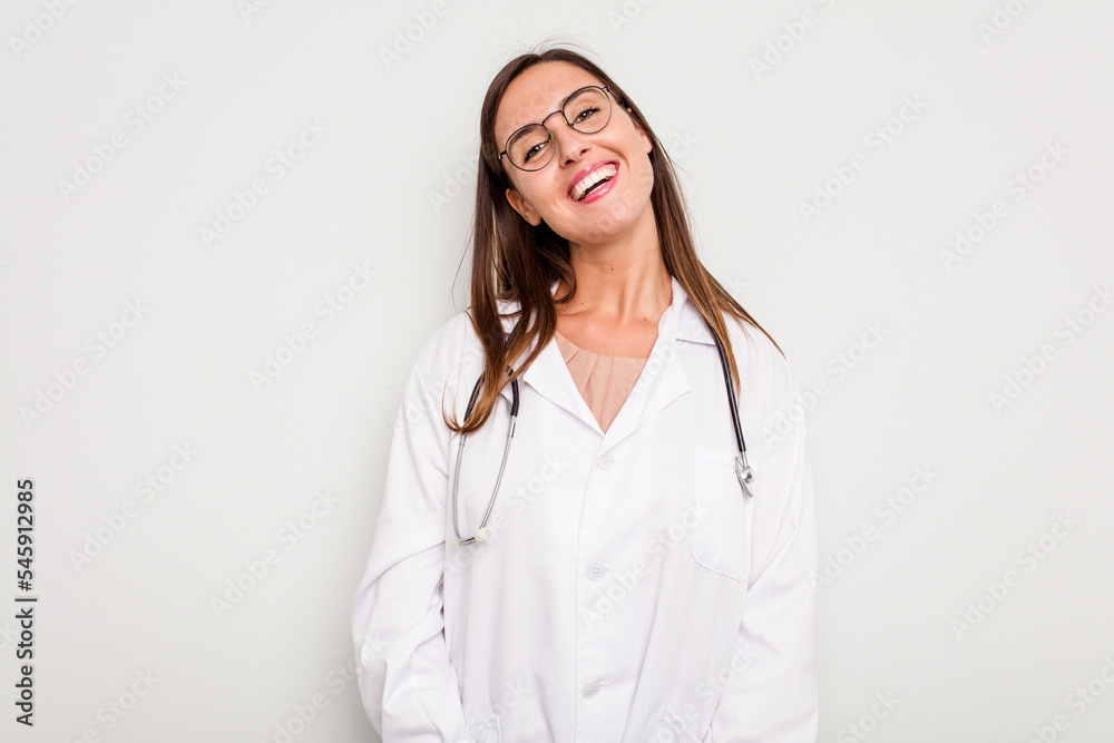 Young doctor woman isolated on white background happy, smiling and cheerful. Young doctor woman isolated on white background happy, smiling and cheerful.