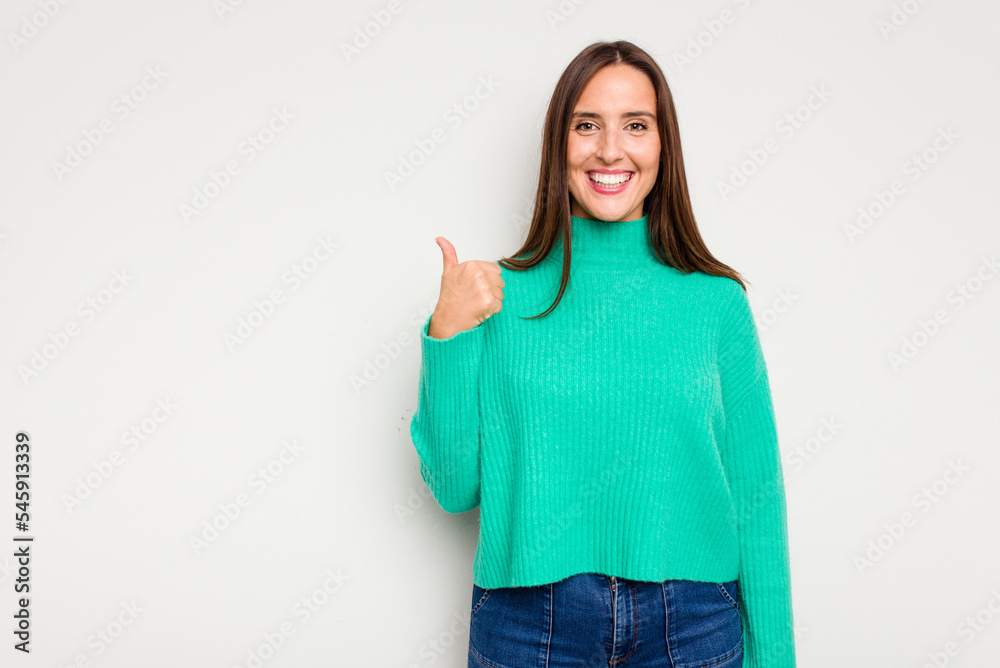 Young caucasian cute woman isolated on white background smiling and raising thumb up Young caucasian cute woman isolated on white background smiling and raising thumb up