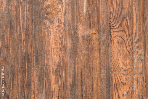 The background of the surface of a high-quality wooden image, a copy of the space. The texture of a brown wooden board with natural patterns, varnished