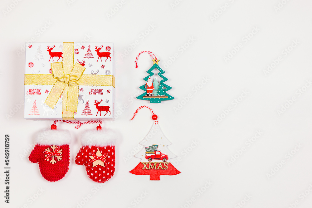 Christmas banner, holiday box with toys on a white background.
