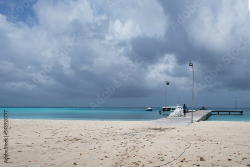 Fulidhoo ferry and speedboat jerry during hot afternoon day.