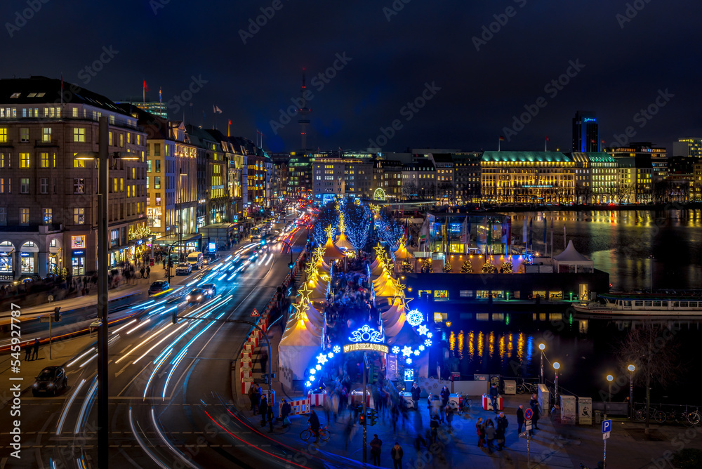 View onto the traffic at the christmas market White magic at Jungfernstieg in Hamburg