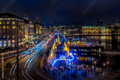 View onto the traffic at the christmas market White magic at Jungfernstieg in Hamburg