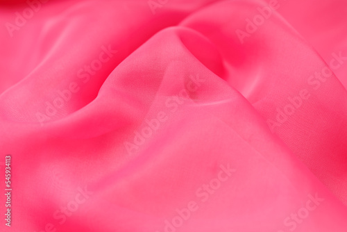 pink silk. wavy fabric. background for design