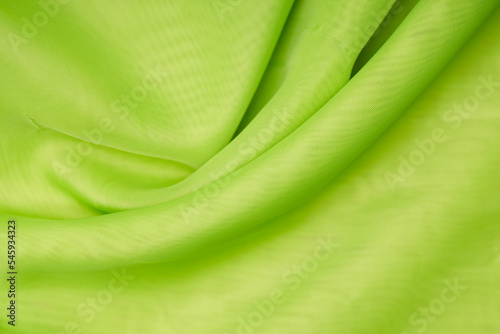 green silk. wavy background fabric