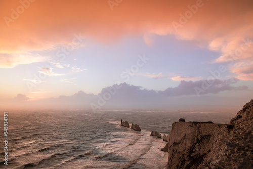 Obraz na plátně Stormy sunset at The Needles viewpoint Isle of Wight south east England UK