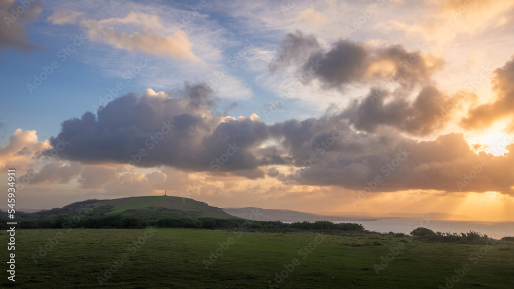 Fototapeta premium Stormy dawn morning on Tennyson Down Isle of Wight south east England