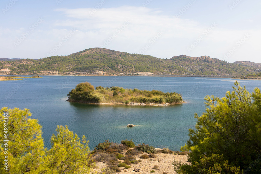 Panoramic view of Gadouras Dam. Solving the important and crucial water supply problems.
Near the villages of Lardos and Laerma in the southern part of the island. Rhodes, Greece. Panoramic view of Gadouras Dam. Solving the important and crucial water supply problems.
Near the villages of Lardos and Laerma in the southern part of the island. Rhodes, Greece.