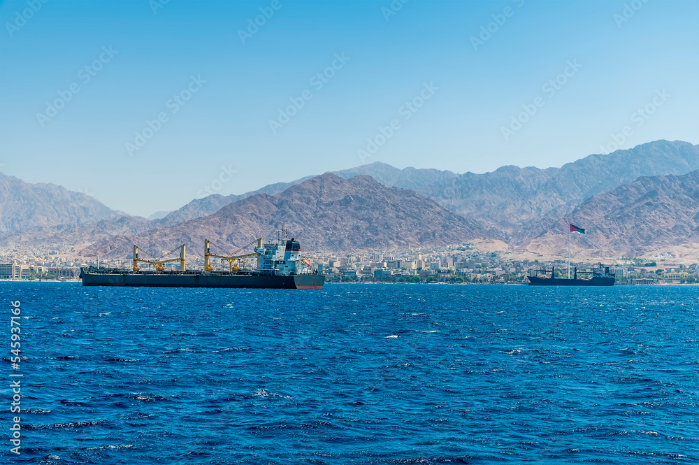 A view of boats moored in the Bay of Aquaba in front of Aqaba, Jordan in sumertime