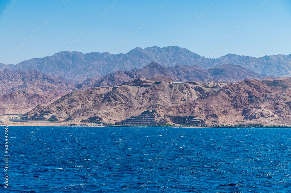 A view from the Bay of Aquaba towards developments around Aqaba, Jordan in sumertime