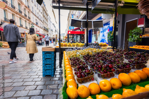 Fototapeta Naklejka Na Ścianę i Meble -  Fruits and vegetables on display at a street market in Paris, France