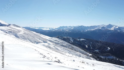 Beautiful mountain landscape in winter. First snow on the branches. Panoramic view from Alpaca Gazprom Resort. Late autumn.