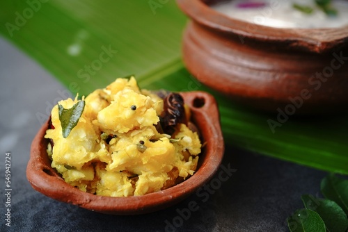 Kanji and Kappa- traditional kerala comfort food porridge with yucca, selective focus photo