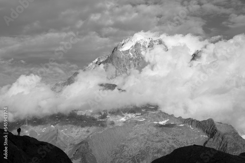 The of Aiguilles Verte and Petit Dru peaks in the clouds - Chamonix.