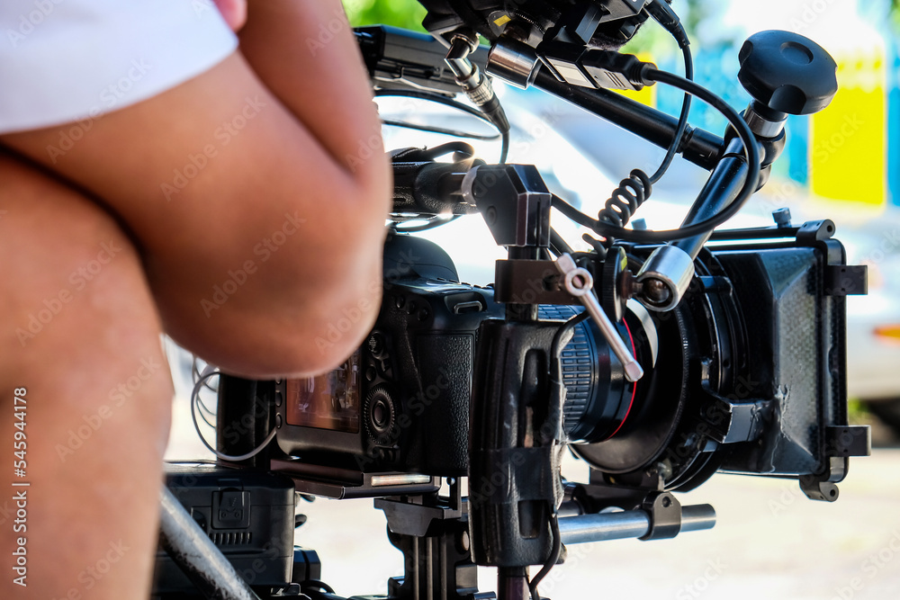 Fototapeta premium detail of Video camera , film crew production, behind the scenes background