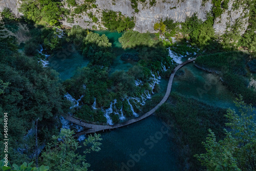 Top view of Plitvice Lakes with waterfalls with crystal clear water in surrounding forest in The Plitvice Lakes National Park in Croatia Europe. © ILLYA