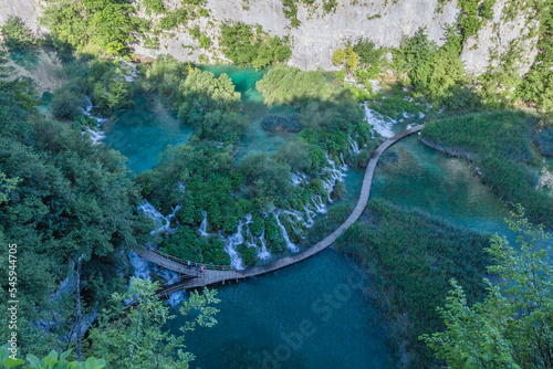 Top view of Plitvice Lakes with waterfalls with crystal clear water in surrounding forest in The Plitvice Lakes National Park in Croatia Europe.