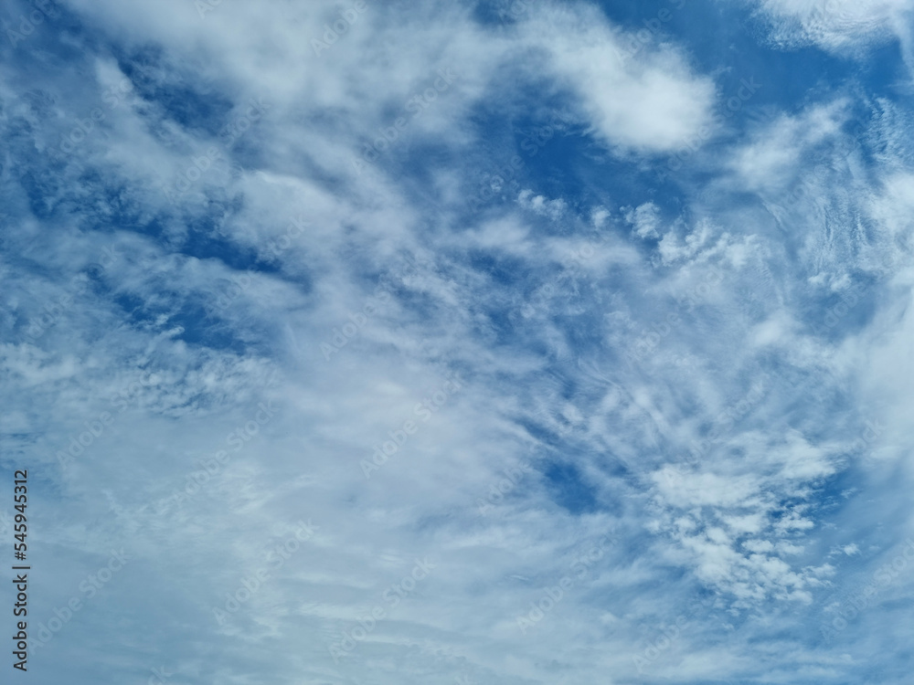 It is a blue sky with pretty clouds. It is a blue sky with pretty clouds.