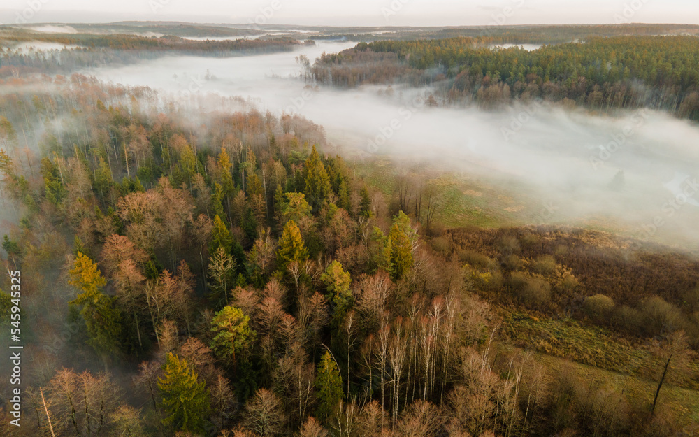 The landscape from the flight of the drone on the river valley is obscured by fog The landscape from the flight of the drone on the river valley is obscured by fog