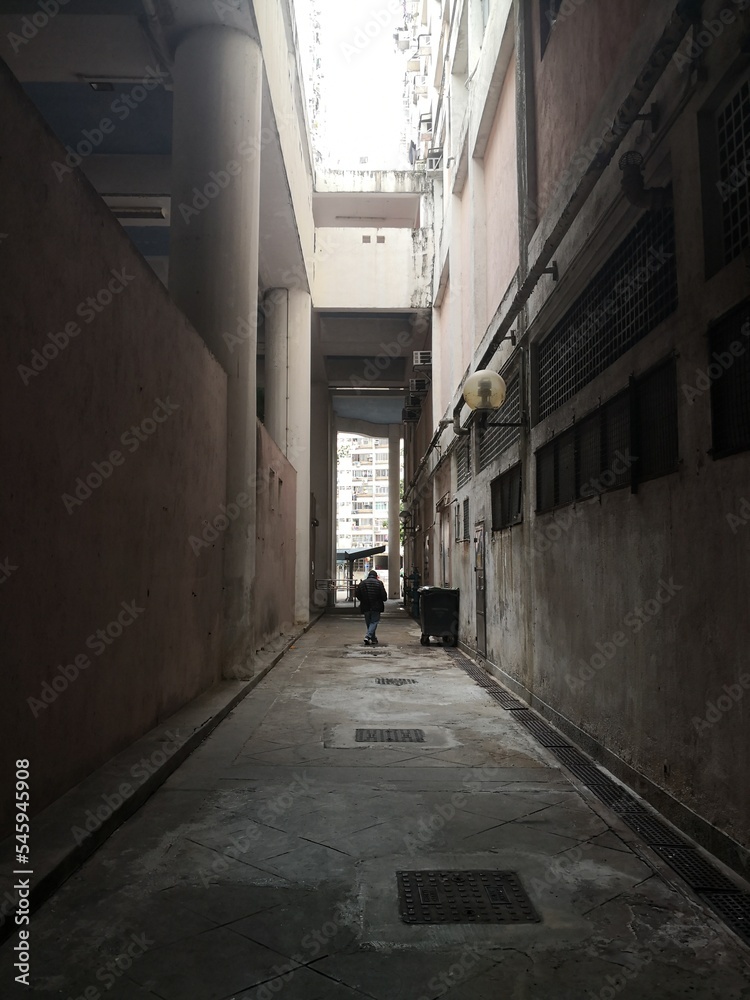 old man in narrow street old man in narrow street