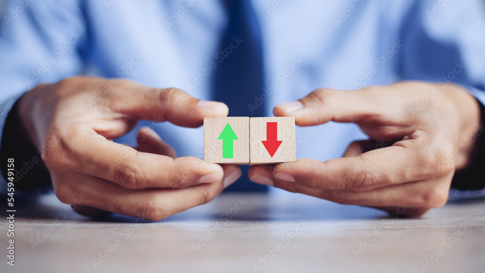 businessman hand arranging wood block stacking as step stair with arrow up.concept for business growth success process. businessman hand arranging wood block stacking as step stair with arrow up.concept for business growth success process.