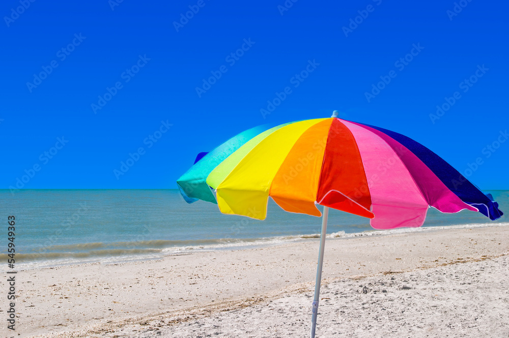 Rainbow of colors in colorful beach umbrella