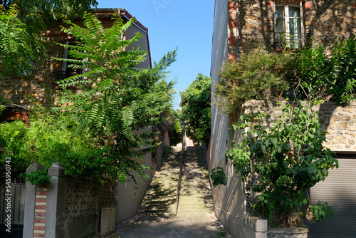 Staircase to the  countryside neighborhood  in the 20th arrondissement of Paris city © hassan bensliman