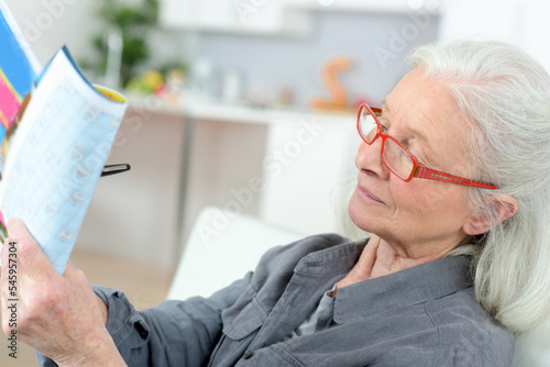 elderly woman answering memory games photo