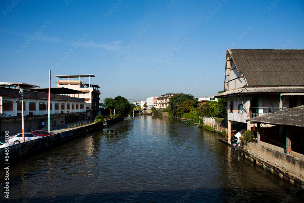 View landscape cityscape of Bangbuathong village with Pimonratch canal and house home riverside local life lifestyle of thai people at Bang Bua Thong city on November 3, 2022 in Nonthaburi, Thailand