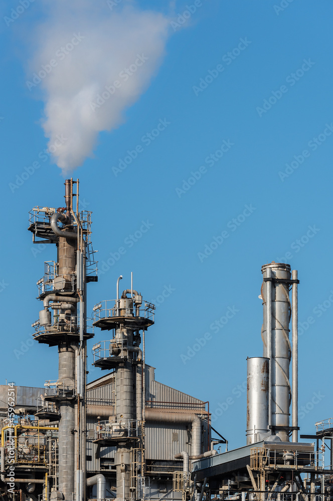 Closeup view of chimney of chemical factory Closeup view of chimney of chemical factory