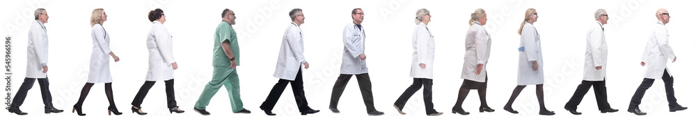 group of doctors in motion isolated on white group of doctors in motion isolated on white