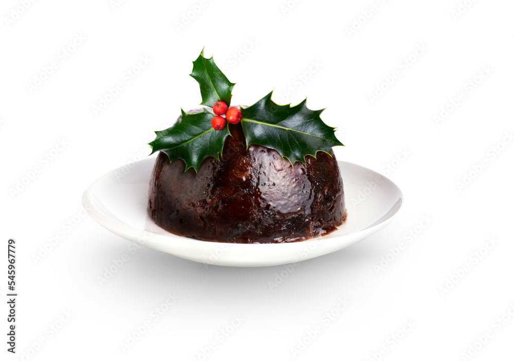 A traditional festive fruit Christmas steamed pudding with holly on the top isolated against a transparent background.