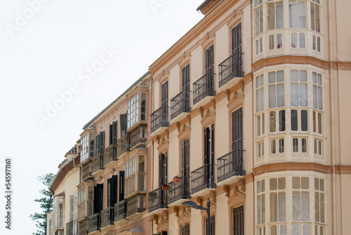 Balconys detail on old buidling in cadiz spain photo