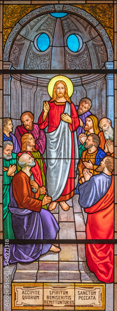 ALAGNA, ITALY - JULY 16, 2022: The  Jesus give authority to his disciples to forgive sins in the stained glass of church  San Giovanni Battista by O. Janni