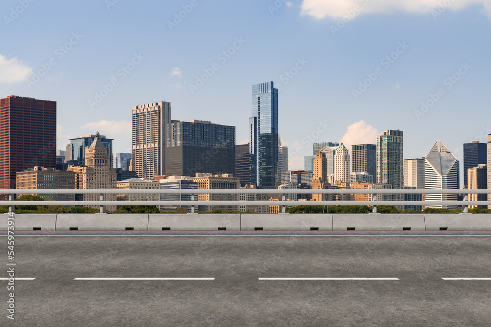 Empty urban asphalt road exterior with city buildings background. New modern highway concrete construction. Concept of way to success. Transportation logistic industry fast delivery. Chicago. USA. Empty urban asphalt road exterior with city buildings background. New modern highway concrete construction. Concept of way to success. Transportation logistic industry fast delivery. Chicago. USA.