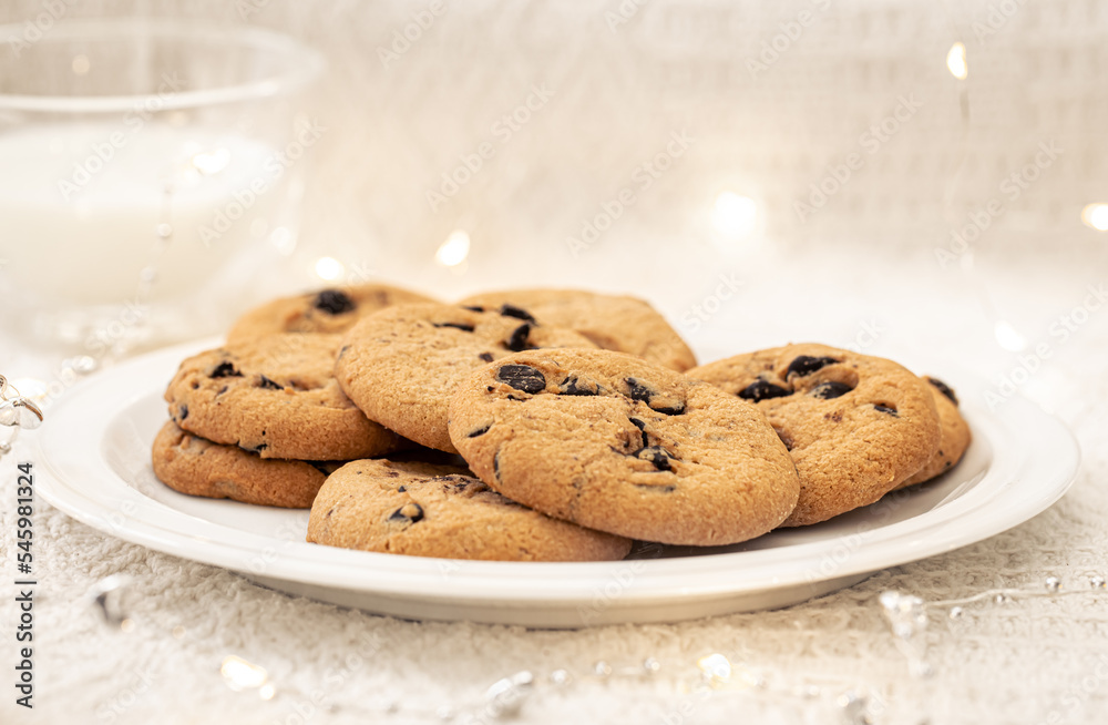 Cookies with chocolate chips close-up and glass of milk. Cookies with chocolate chips close-up and glass of milk.