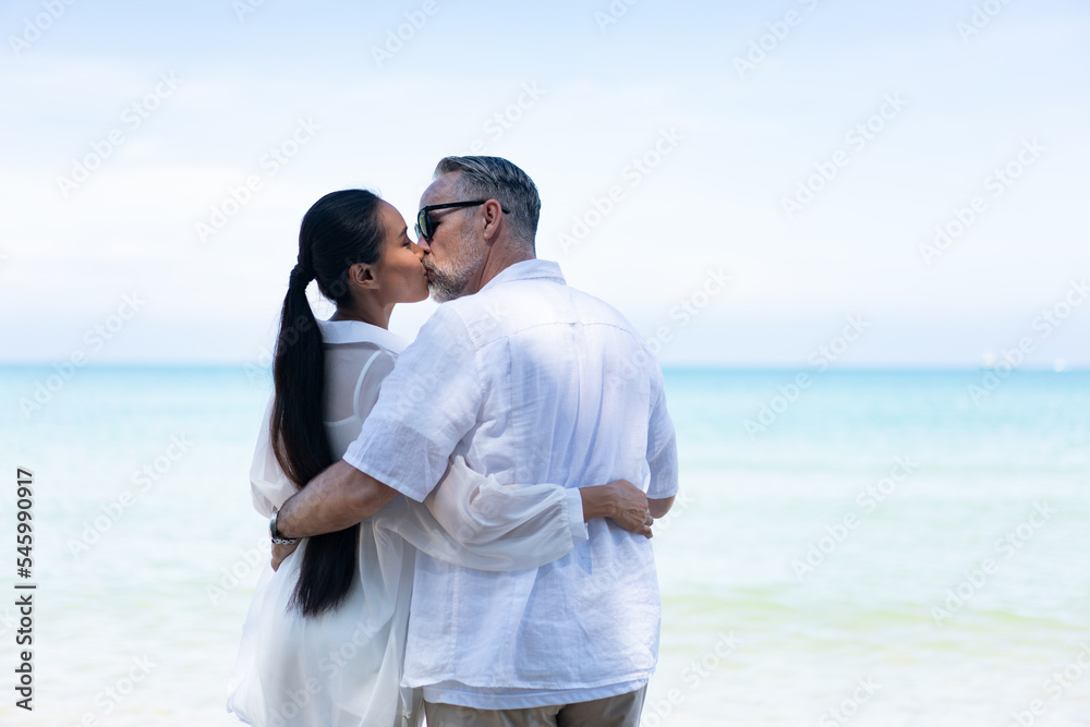 Romantic Couple Walking on the Beach. portrait of living young couple at the beach. Romantic marriage proposal at the seaside on the beach sea. Romantic marriage proposal on the beach. Romantic Couple Walking on the Beach. portrait of living young couple at the beach. Romantic marriage proposal at the seaside on the beach sea. Romantic marriage proposal on the beach.