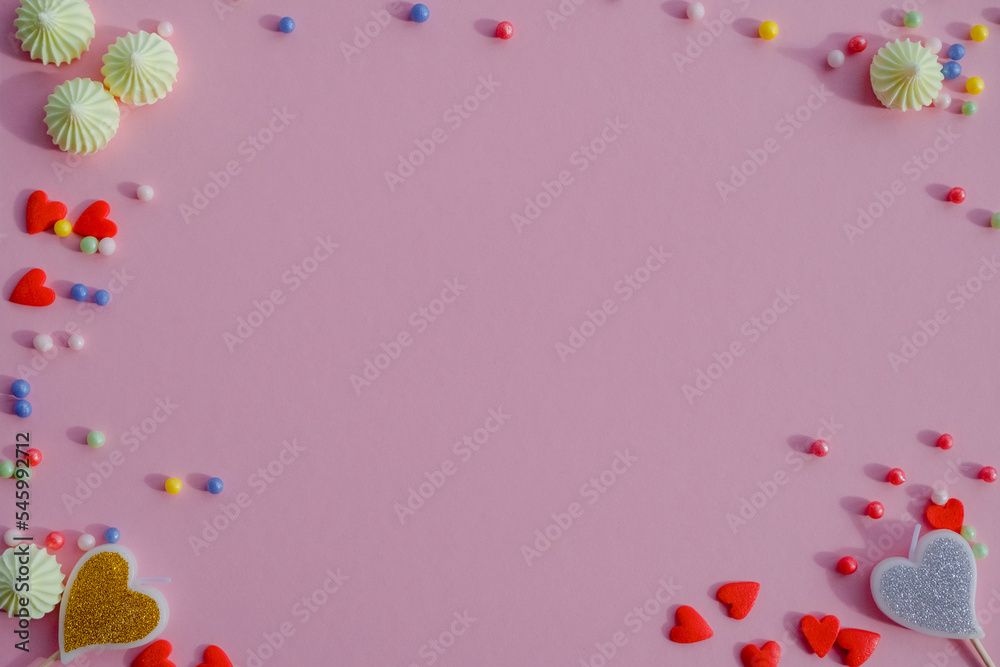 holiday greeting card on pink background, valentine frame, beauty, birthday and love concept with sweets, red hearts and marshmallow holiday greeting card on pink background, valentine frame, beauty, birthday and love concept with sweets, red hearts and marshmallow