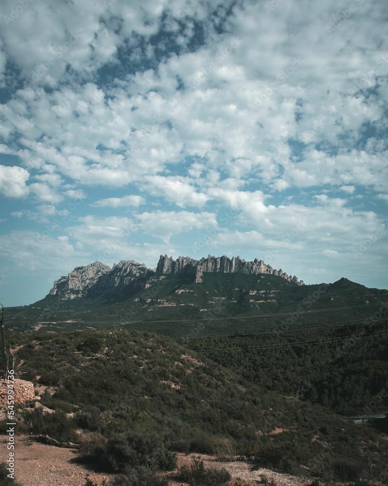 Vertical shot of beautiful daytime view of the Montserrat mountain