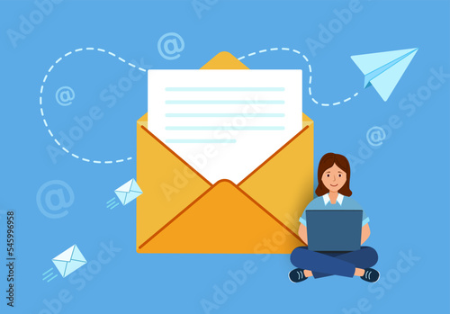 concept An email. the letter is in an envelope. Girl writes an email. Open yellow envelope