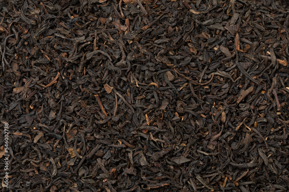 Chinese Keemun dried tea leaves close up full frame as background Chinese Keemun dried tea leaves close up full frame as background
