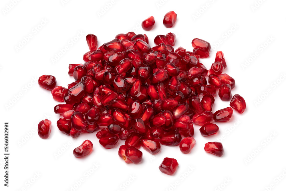 Heap of fresh red pomegranate seeds isolated on white background close up