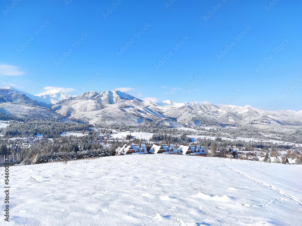 beautiful winter panorama snowy tatra mountains against the blue sky, Poland