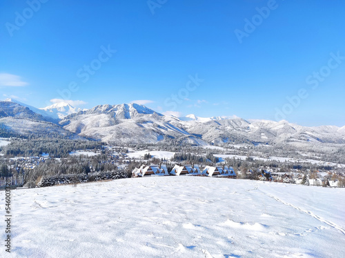 beautiful winter panorama snowy tatra mountains against the blue sky, Poland © Svitlana