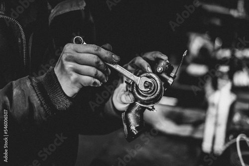 Closeup shot of a man using an electric pump