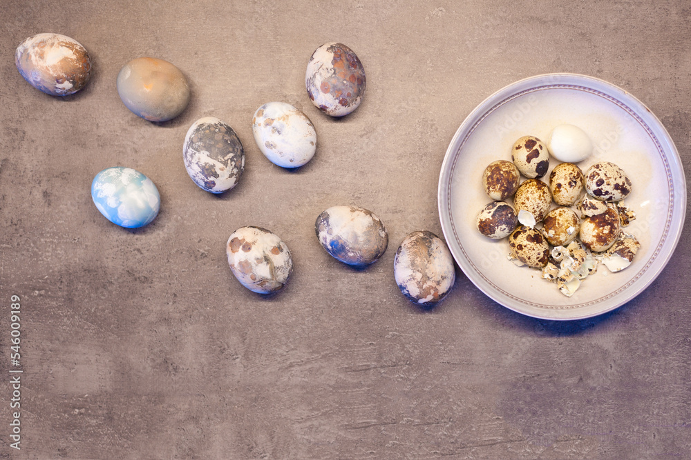 eggs on concrete. Happy Easter card: marble stone effect painted. top view, quail eggs flat lay eggs on concrete. Happy Easter card: marble stone effect painted. top view, quail eggs flat lay