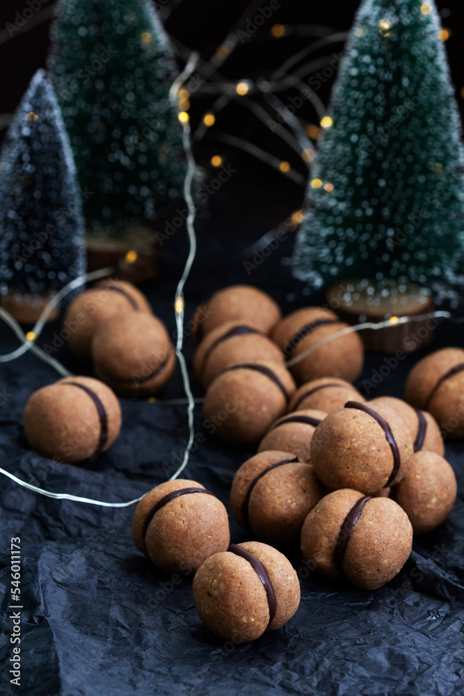 Lady's kisses, traditional Italian nut cookies with coffee and chocolate filling.