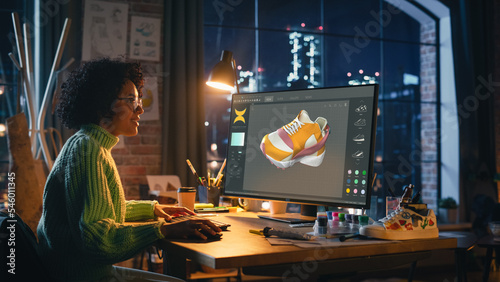 Obraz na plátne Multiracial Female Designer Comes Up with Design of Sneakers by Creating a Model It in the Software for 3d Visualisation